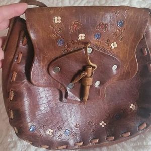 Vintage leather tooled, laced hobo purse